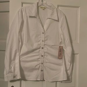 Women’s white button down shirt with silver colored buttons
